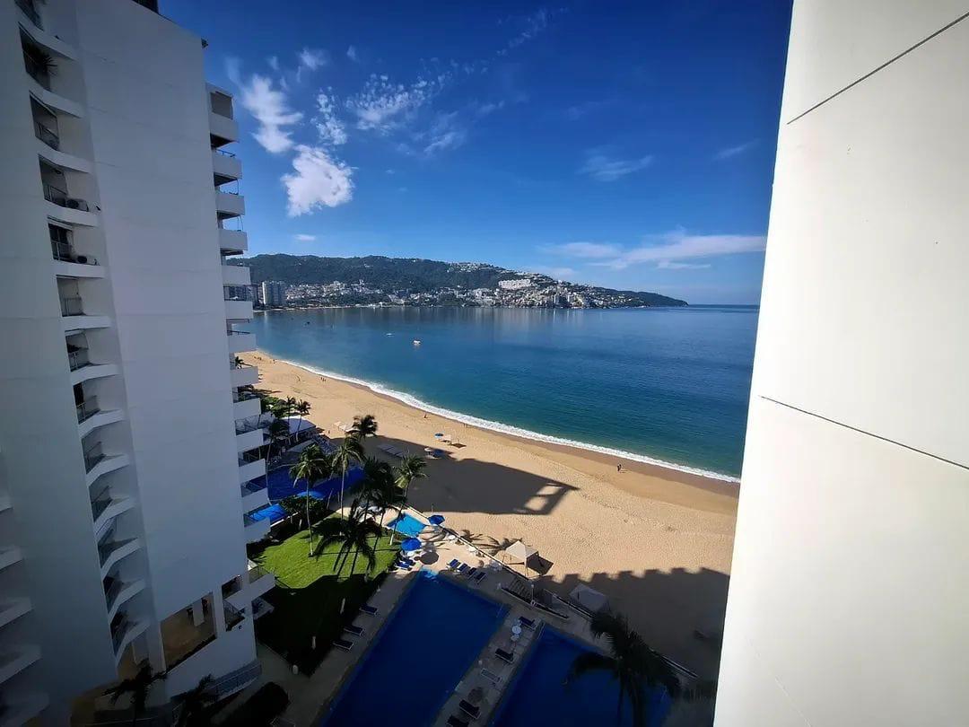 The view over the beach and pool